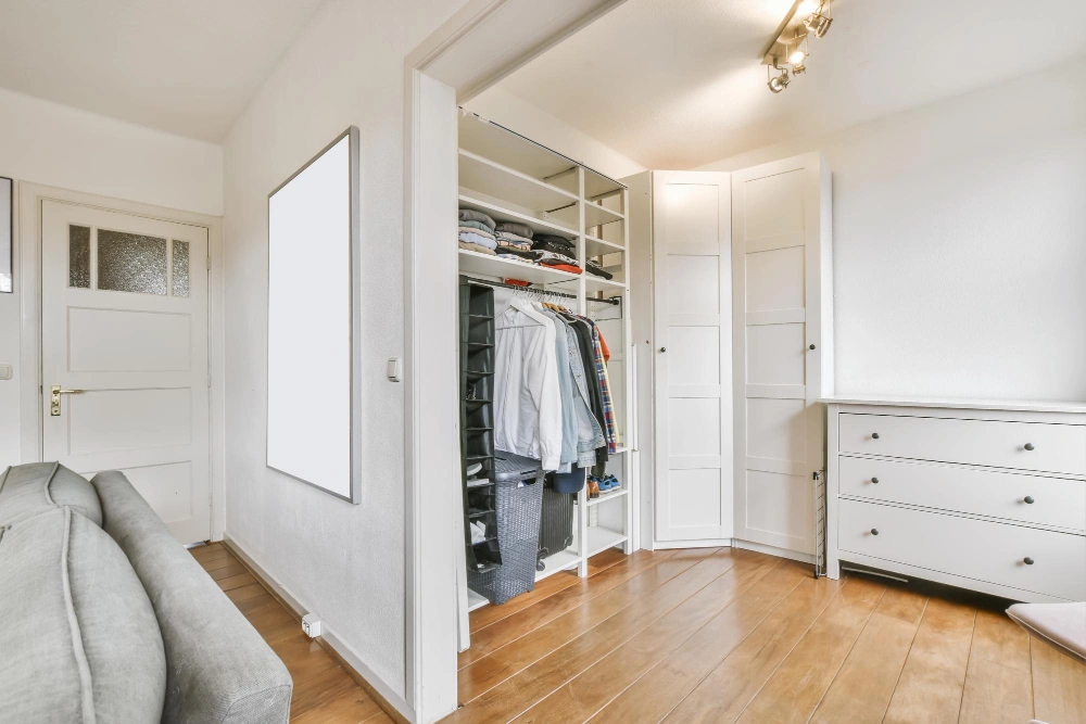Modern custom entryway closet with shelving, and built-in cabinetry by Los Angeles Closet