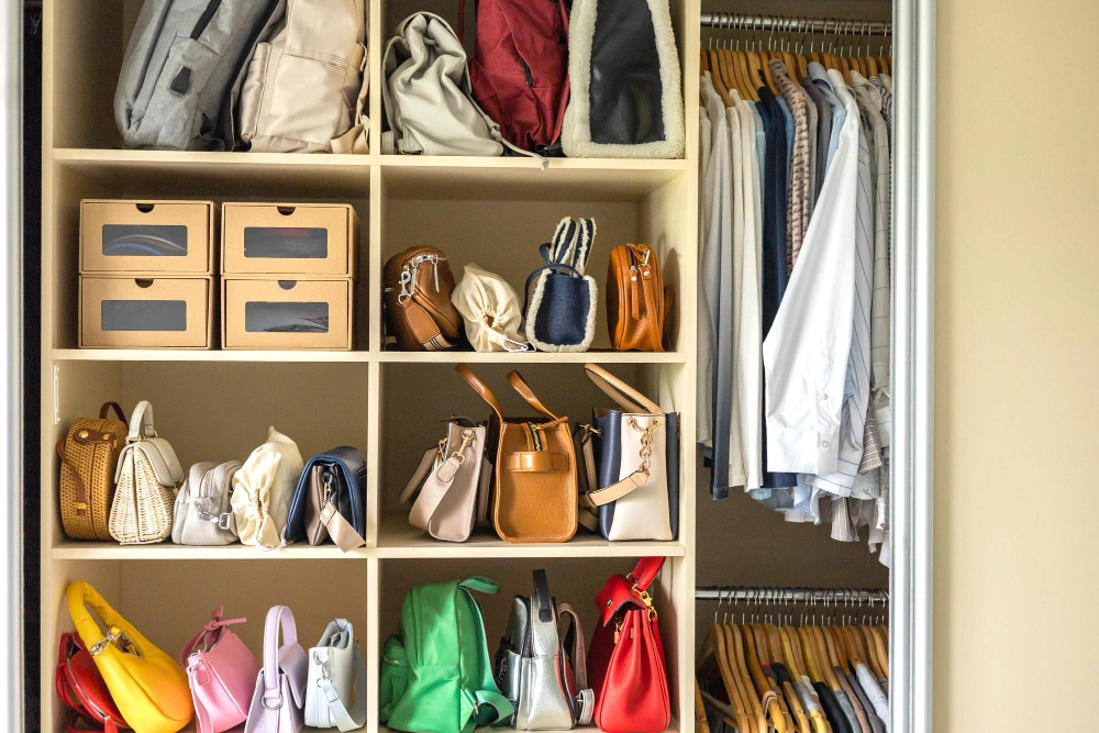 Minimalist reach-in wardrobe system with open shelves and double doors by Los Angeles Closet